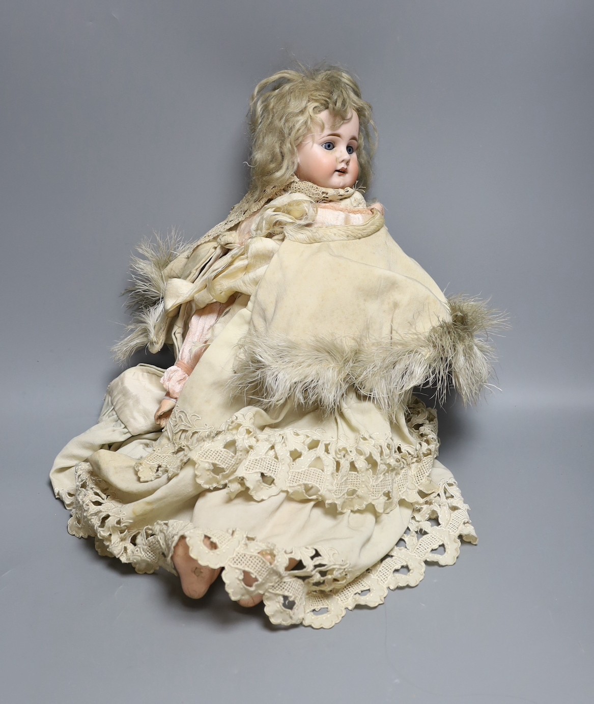 A late 19th century German bisque head doll, impressed mark 300/9, 53cm